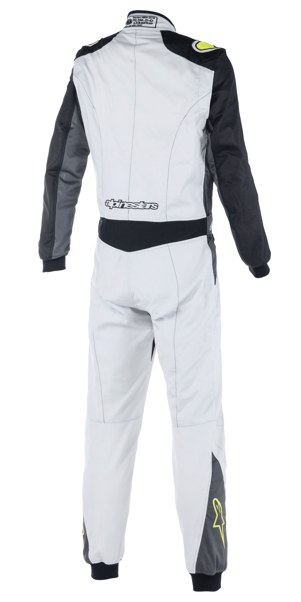 Traje Alpinestars Atom FIA, mono de automovilismo, plata, antracita y amarillo flúor, vista posterior que muestra mangas negras y panel en la cintura, logotipo de Alpinestars en la parte baja de la espalda, estrellas amarillas en la parte inferior de las piernas, ropa de automovilismo con certificación FIA