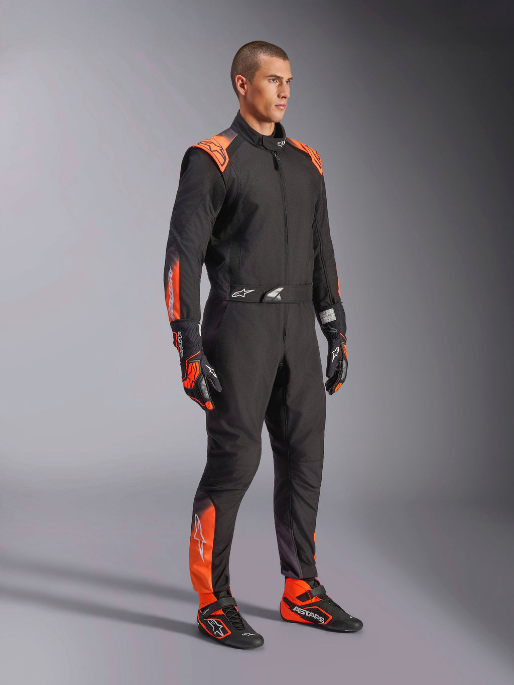 Alpinestars KMX-5 V3, traje de karting para hombre, negro y naranja fluo, certificado FIA grado 1, usado por un modelo