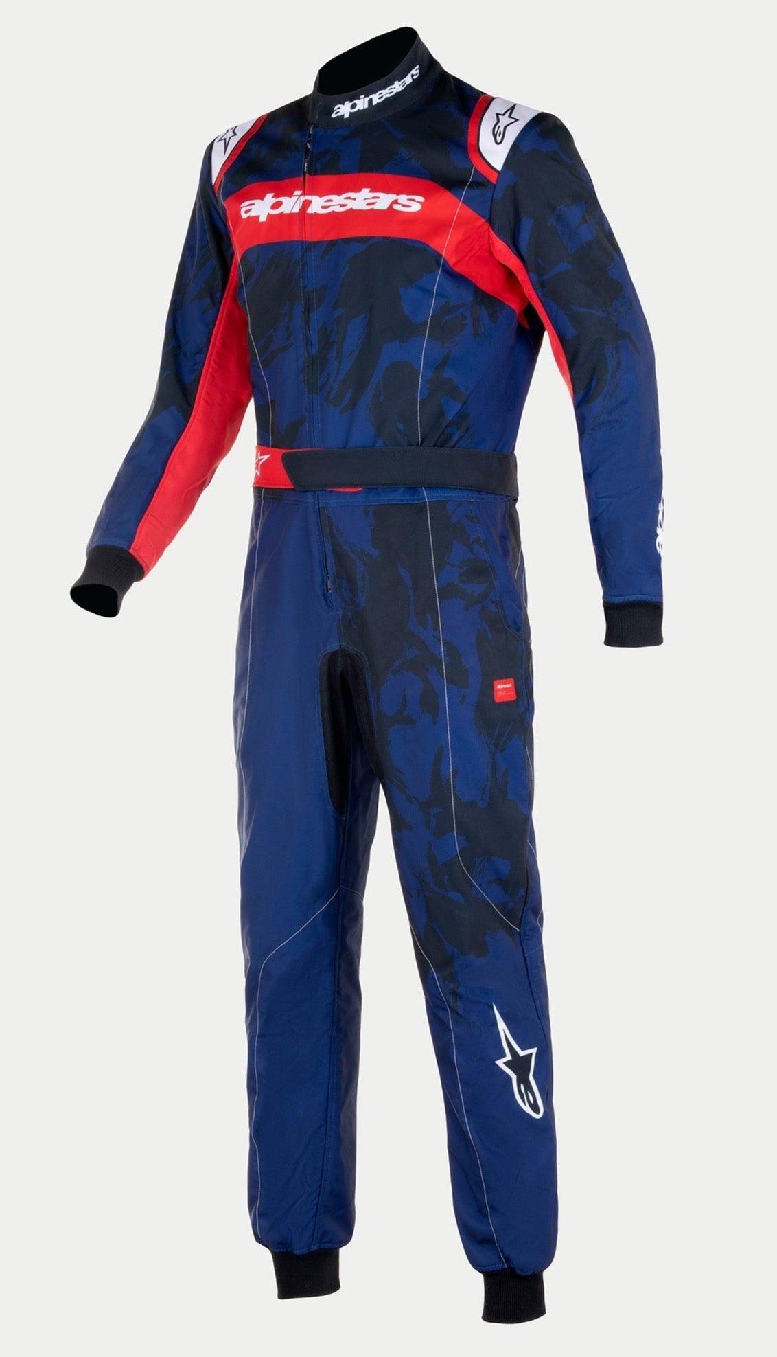 Alpinestars Youth KMX-9 V3 Graphic 5 Suit, mono de karting, azul marino y rojo, con un patrón gráfico abstracto en azul oscuro, panel rojo en el pecho con logotipo de la marca en blanco, puños y cuello acanalados en negro, diseño profesional de una sola pieza para carreras