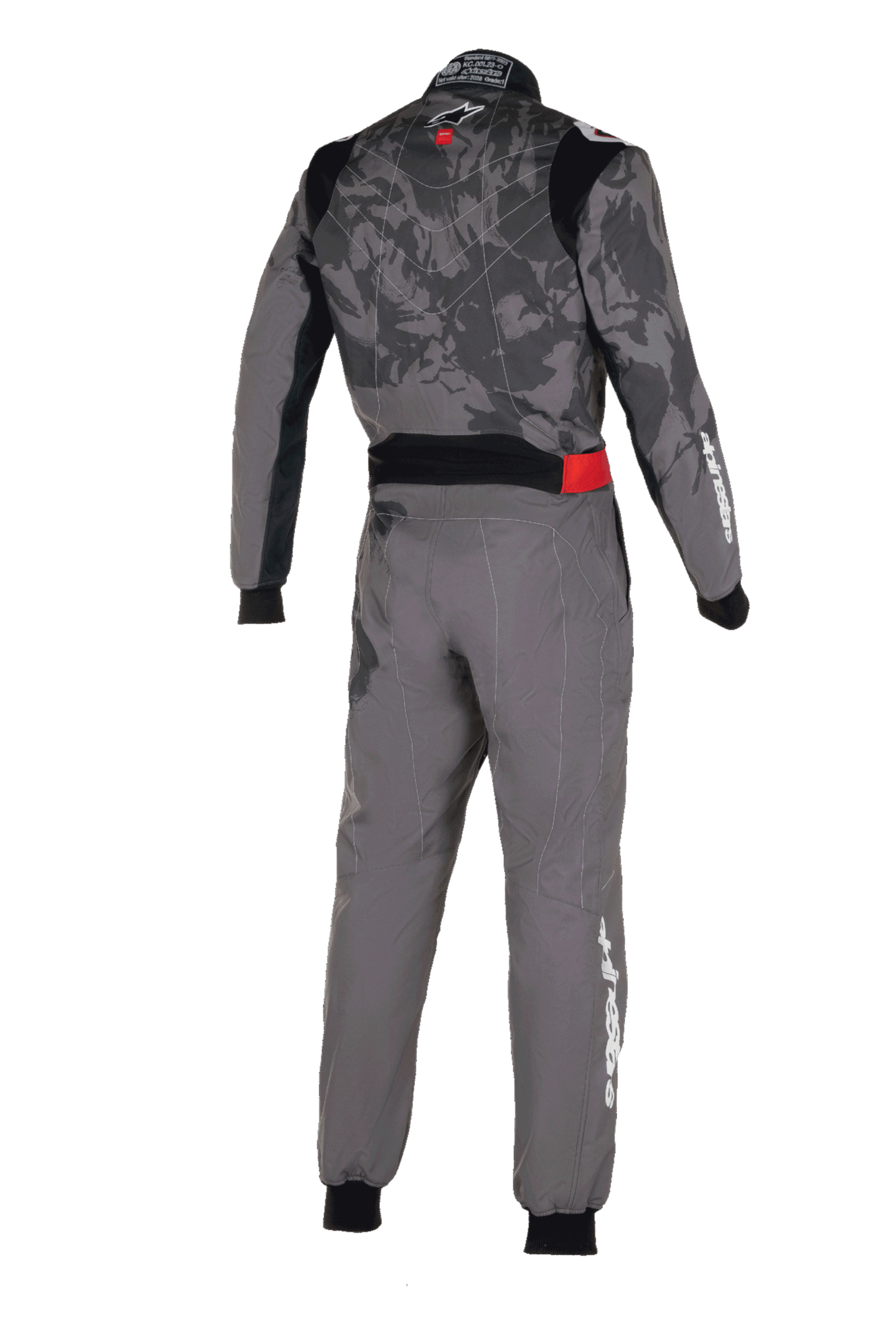 Alpinestars KMX-9 V3 Graphic 5 Suit, mono de karting, gris oscuro y negro, vista trasera con un patrón gráfico de camuflaje en el torso, detalle rojo en la cintura y logotipos de Alpinestars en blanco en la manga y la pierna