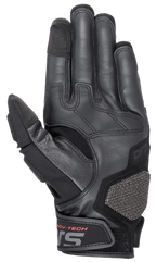 Guantes de Cuero Halo de Alpinestars, guantes de moto para Adventure Touring, azul oscuro y negro, vista de la palma con cuero de cabra premium, zonas de agarre de goma, almohadilla de protección ARshield y letras ADV-TECH en rojo en el cierre de la muñeca.