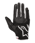 Guantes Alpinestars Stella SMX-2 Air Carbon V2 para mujer, guantes de moto, vista de la palma, negro y blanco con detalles fucsia, confección en piel y malla con palma reforzada y puntas de los dedos compatibles con pantallas táctiles