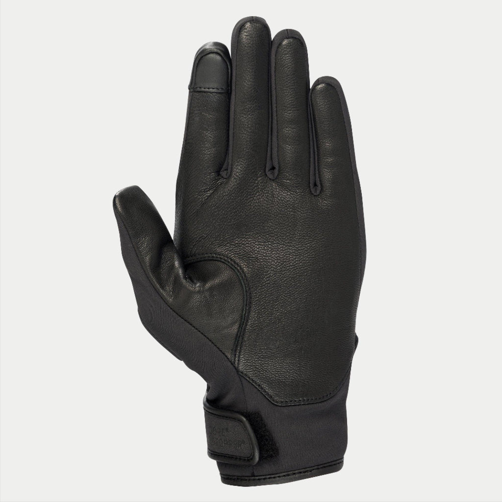 Guantes Alpinestars C1 Windstopper V2, negros, vista de la palma con refuerzos de cuero de plena flor en la palma y el pulgar, punta del dedo índice compatible con pantallas táctiles, puño corto con cierre de gancho y bucle, guante de moto para conducción urbana