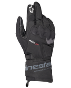 Alpinestars WT-3 Drystar Insulated Gloves, guantes negros de moto para turismo, construcción impermeable y aislada con protección de nudillos moldeada, logotipo de estrella blanca en el dedo índice y puño de longitud media con la marca Alpinestars.