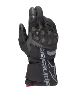 Alpinestars WT-4 Gore-Tex Insulated Glove, guante de moto negro, protección rígida de nudillos, confección en cuero y tejido, tecnología impermeable GORE-TEX, logotipo y marca Alpinestars en plateado en el puño, detalle rojo en la muñeca, guante para conducción en invierno