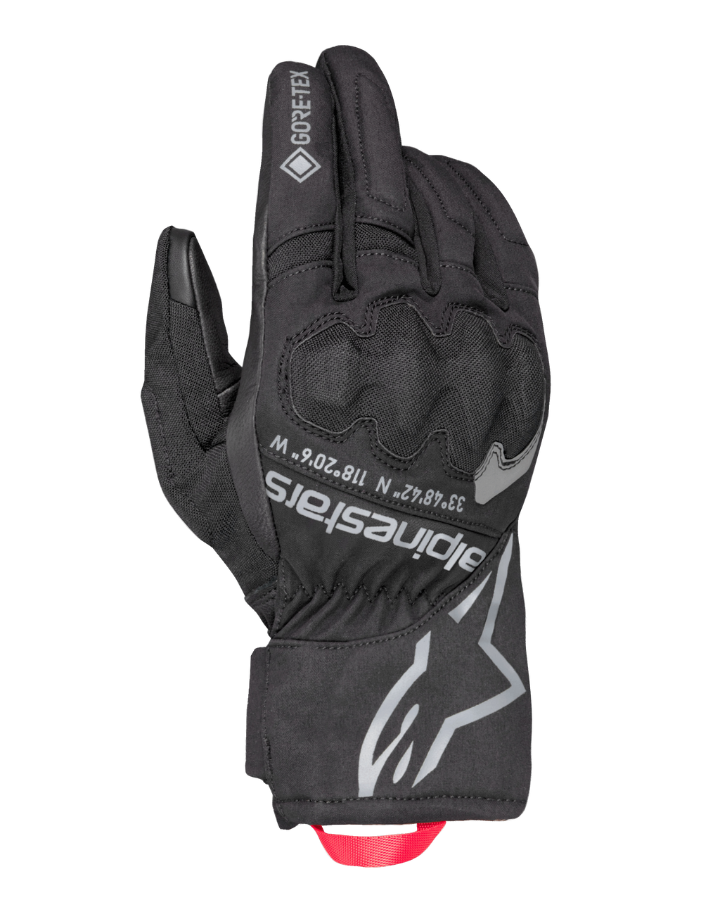 Alpinestars Crestone GORE-TEX Insulated Gloves, guantes de moto touring negros, dorso textil impermeable y transpirable, protección de nudillos integrada, logotipo y coordenadas Alpinestars en color plata, tirador de cinta roja