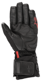 Guantes Alpinestars HT-7 Heat Tech Drystar®, guantes de moto calefactables negros, con palma de cuero y confección softshell, logotipo Alpinestars rojo, tecnología impermeable Drystar® y puño ajustable para conducción en carretera con clima frío