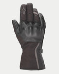 Guantes Alpinestars Stella Tourer W-7 Drystar® para mujer, negros, guantes de moto de invierno estilo guantelete con construcción de cuero y softshell, con protección rígida en los nudillos recubierta de cuero, detalles plateados reflectantes y logotipo de Alpinestars en el dedo.