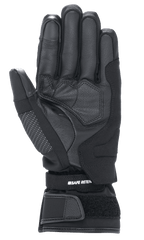 Alpinestars Stella Andes V3 Drystar® para mujer, guantes de moto en color negro antracita, vista de la palma que muestra la construcción en cuero de cabra, acolchado reforzado y correa de muñeca ajustable con velcro y marca Safe Retention