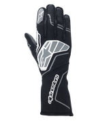 Guantes Alpinestars Tech-1 ZX V4, guantes para automovilismo, negro y gris antracita, con un gran logo de estrella en el dorso y la marca Alpinestars en el puño largo, logo de estrella en el dedo índice, construcción profesional resistente a las llamas