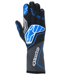 Guantes Alpinestars Tech-1 ZX V4, guantes de automovilismo, negros con detalles en azul y gris, con el logotipo de la estrella y el nombre de Alpinestars en blanco, construcción de tejido de panal, equipamiento profesional para deportes de motor