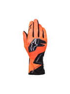 Guantes Alpinestars Youth Tech-1 K Race S V2 Graphic 1, guantes de karting, naranja flúor y negro, con un llamativo logo de estrella y gráficos agresivos, vista del dorso con inserciones de malla negra en los dedos, construcción textil ligera para competición juvenil