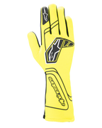 Alpinestars Tech-1 Start V4 Gloves FIA, guantes de automovilismo, amarillo fluorescente y negro, con un gran logotipo de estrella negra en el dorso, confección de dedos sin costuras y puño extendido para protección contra el fuego, equipo de automovilismo homologado por la FIA