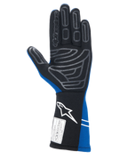 Guantes Alpinestars Tech-1 Start V4 FIA, guantes de automovilismo, azul real y negro, vista de la palma con patrón de agarre de silicona gris en los dedos y la palma, puño extendido con logotipo blanco y etiqueta de homologación FIA