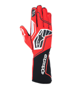 Guantes Alpinestars Tech-1 KX V4, guantes para carreras de karting, rojos y negros con detalles blancos, confección en malla transpirable, logotipo de estrella llamativo en el dorso, puño largo con el nombre de Alpinestars, equipo profesional de automovilismo