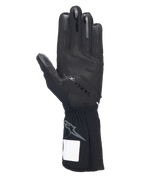 Guantes Alpinestars Tech-1 KX V4, guantes de karting, negros, vista de la palma con patrón de agarre de silicona 3D, costuras externas y puño acanalado con logotipo de Astars en gris, equipamiento profesional para automovilismo