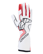 Guantes Alpinestars Tech-1 Race V4, guantes de automovilismo, blancos y rojos con detalles en negro, con un llamativo logotipo de Alpinestars en el dorso de la mano, emblema de estrella roja en el dedo índice y diseño de puño largo profesional