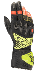 Alpinestars GP Tech V2, guantes de moto para carreras, negros con detalles en amarillo flúor y rojo, con protección rígida en los nudillos, puño de cuero perforado con logotipo DFS y paneles elásticos de acordeón para una flexibilidad óptima.