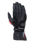 Guantes Alpinestars Honda SP-8 V3, guantes de moto, negros con acentos en rojo y azul, vista de la palma que muestra la construcción de cuero de grano completo, deslizador de palma reforzado, detalles perforados y puño extendido con el logotipo de Alpinestars.