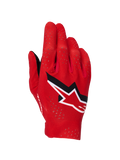 Guantes Alpinestars Supertech MX, guantes de motocross, rojo fuego, negro y blanco, vista del dorso con perforaciones láser para ventilación, logotipo destacado de la estrella de Alpinestars en blanco y negro, diseño de tejido elástico ligero para carreras off-road