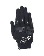 Guantes Alpinestars SP X 3, guantes de moto de puño corto en negro y blanco, vista superior que muestra la protección de nudillos de TPU de doble densidad, el gran logotipo de estrella blanca y protectores de dedos, diseñados para conducción deportiva y en carretera.