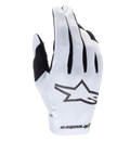 Guantes Alpinestars Radar 2025, guantes de motocross, blancos y negros, con dorso sintético texturizado y un logotipo de estrella negro prominente, detalles negros entre los dedos, cierre de muñeca sin costuras con marca, diseño ligero y ajustado para carreras todoterreno