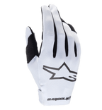 Guantes Alpinestars Radar 2025, guantes de motocross, blancos y negros, con dorso sintético texturizado y un logotipo de estrella negro prominente, detalles negros entre los dedos, cierre de muñeca sin costuras con marca, diseño ligero y ajustado para carreras todoterreno