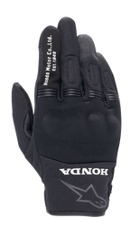 Alpinestars Honda Copper Glove, Black Urban Motorcycle Glove, textured mesh construction, white 'Honda Motor Co. Ltd. Est. 1948' text on the index finger, 'HONDA' logo and Alpinestars star outline on the wrist, hard knuckle protection, lightweight gear for road riding