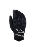 Guantes Alpinestars Manti Air, guantes de moto negros, con malla transpirable y protección de nudillos con patrón de panal texturizado, logo y texto de Alpinestars en blanco en la muñeca, diseño ligero para rutas de aventura en verano
