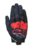 MM93 Spx 1 Gloves, Motorcycle Racing Gloves, Black with Bright Red and White accents, Red protective knuckle guards, featuring the Marc Marquez 93 logo and Alpinestars branding, textured fabric with a sporty performance design