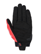 Guantes Alpinestars MM93 SP X 1, vista de la palma, negro y rojo flúor, construcción en cuero sintético con palma perforada, secciones reforzadas, deslizador de TPR en la palma y correa de velcro en la muñeca con el logo de Alpinestars.