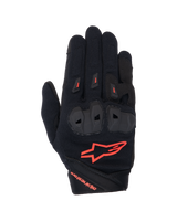 Alpinestars Woman Stella SP X 1 Gloves, Motorcycle Gloves, Black and Red Fluo, featuring ventilated TPR knuckle protection, breathable stretch fabric backhand, and prominent red fluo Alpinestars branding on the cuff and back of hand.