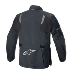 Chaqueta Alpinestars ST-7 2L GORE-TEX, vista trasera, negro y gris oscuro, con paneles reflectantes en los hombros, logotipo plateado de la estrella Alpinestars en la parte inferior de la espalda y correas de ajuste en la cintura, equipamiento de aventura para motociclismo