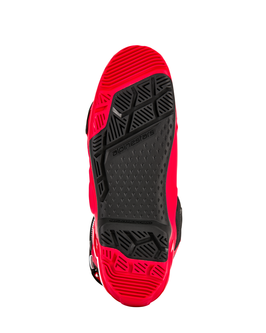 Botas Alpinestars Tech 10 Enduro, rojo brillante y negro, vista inferior de la suela de doble compuesto específica para enduro, con un patrón de dibujo de alto agarre y un inserto central negro reemplazable.