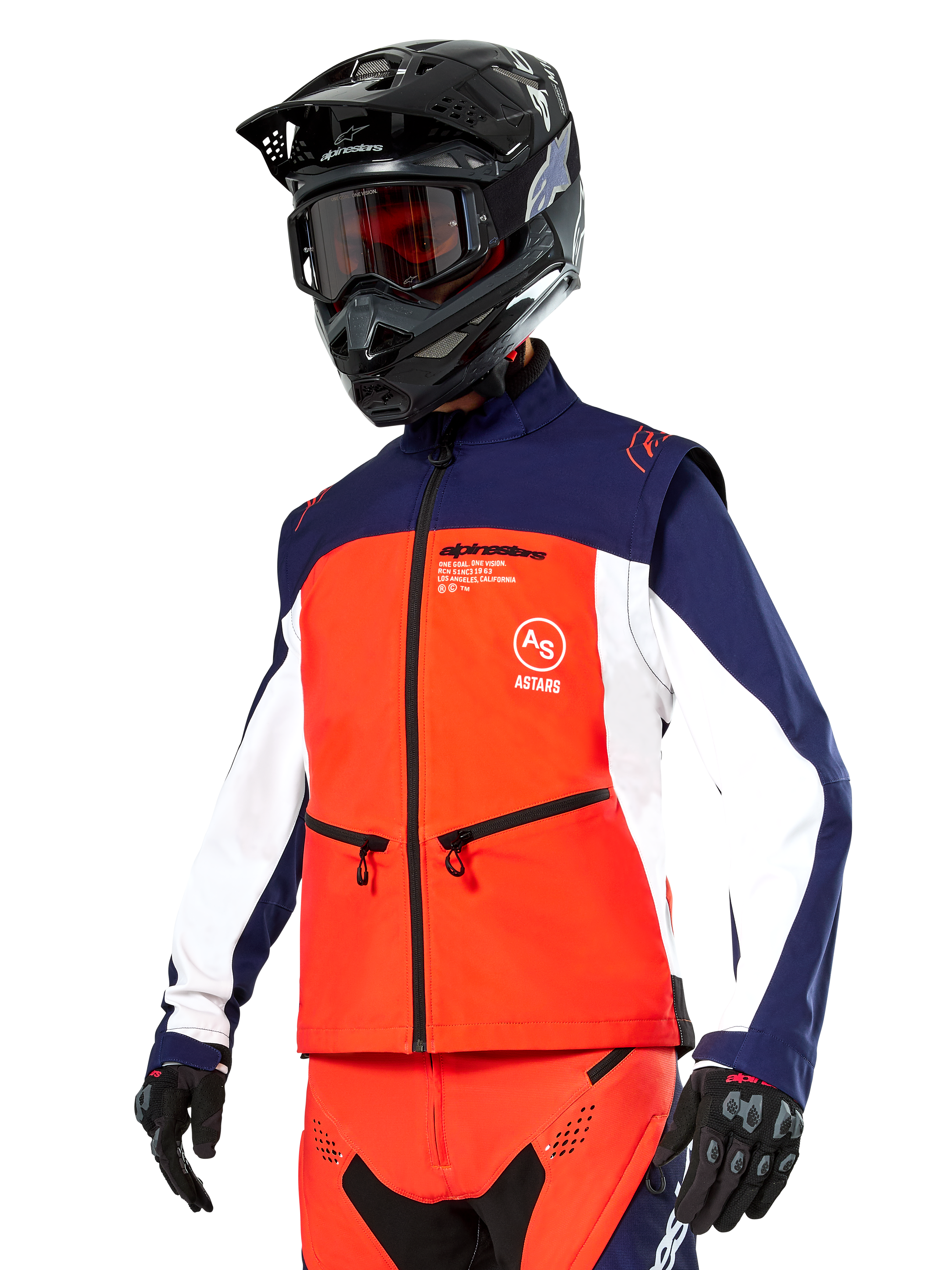Alpinestars Lite-Dura Softshell Jacket in Navy, Hot Orange, and White, Motocross Gear, worn with black helmet and goggles, protective gloves, and matching racing pants