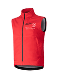 Alpinestars Techstar Softshell Vest, chaleco cortaviento sin mangas en color rojo brillante, cuello alto con cremallera frontal negra, logotipos ASTARS en blanco y negro con el lema 'ONE GOAL ONE VISION' en el pecho, forro interior gris, diseño deportivo para motocross