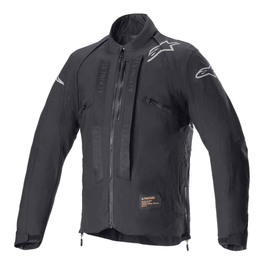 Chaqueta Alpinestars Techdura, chaqueta de motociclismo off-road en color Black Reflex, con logos de estrella blancos en los hombros, marca Alpinestars tonal en los paneles del pecho, cremallera frontal y construcción textil duradera, diseño técnico para enduro