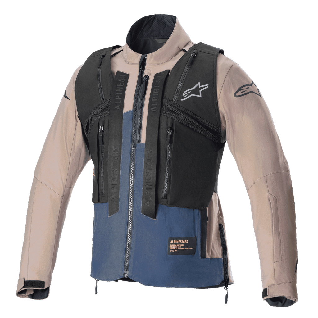 Chaqueta Alpinestars Techdura, marrón Falcon y azul Night Navy, con un chaleco táctico desmontable negro con múltiples bolsillos con cremallera, construcción robusta de poliamida elástica, logo de estrella en el pecho y las mangas, diseñada para enduro y conducción todoterreno.
