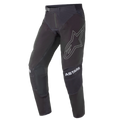 Alpinestars 2021 Techstar Phantom Pants, pantalones de motocross, negros con detalles blancos, con un gran logotipo de estrella perfilado en el muslo, marca ASTARS en las rodillas, tejido técnico antidesgarro con zonas perforadas y construcción de rodilla 3D Babel para un alto rendimiento en carreras todoterreno