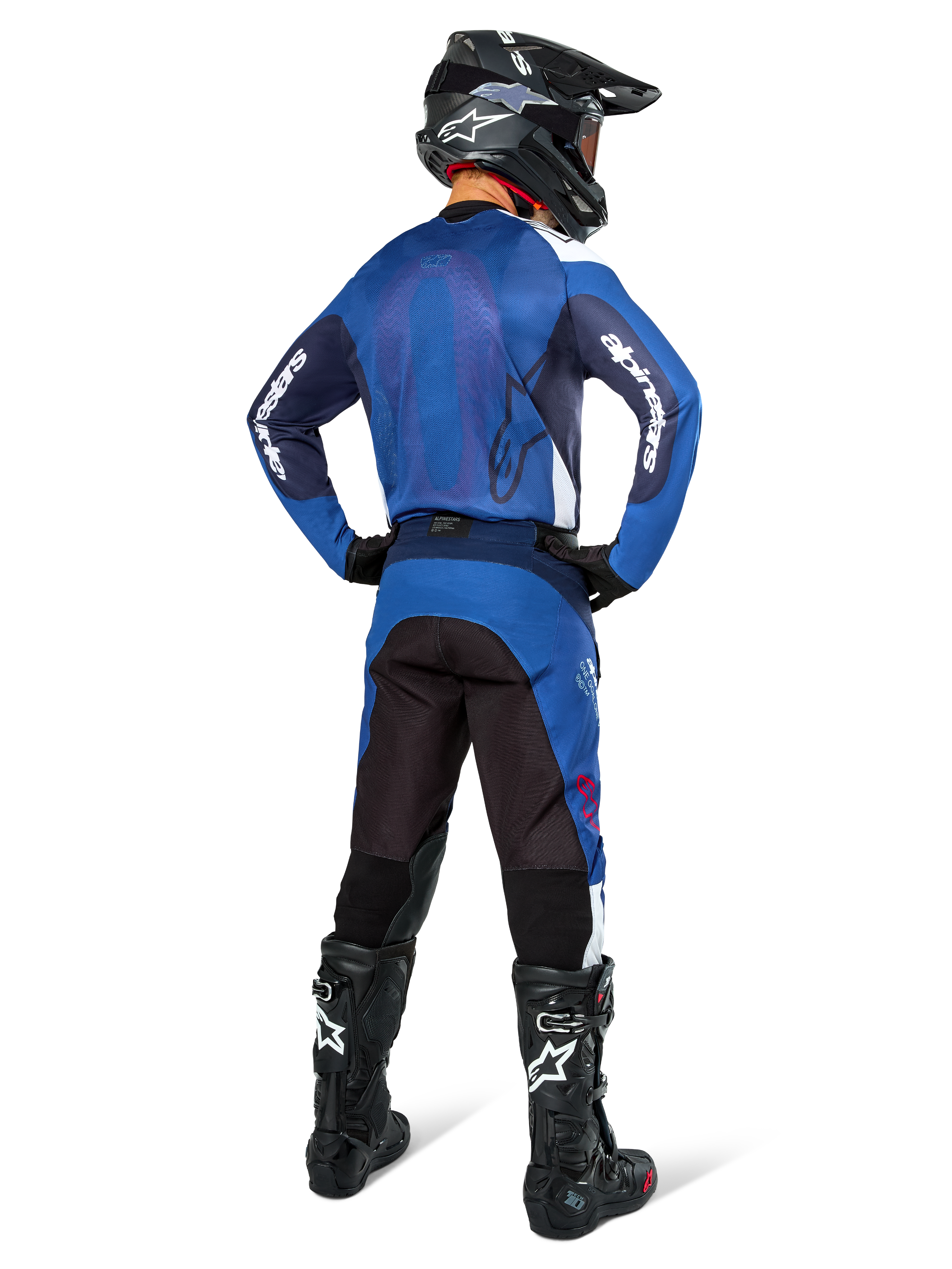 Alpinestars Pro-Dura Pants, Motocross and Enduro Pants, Navy Bright Blue White, back view, worn with matching blue jersey, black helmet, and black Tech boots, durable construction with stretch inserts for off-road riding