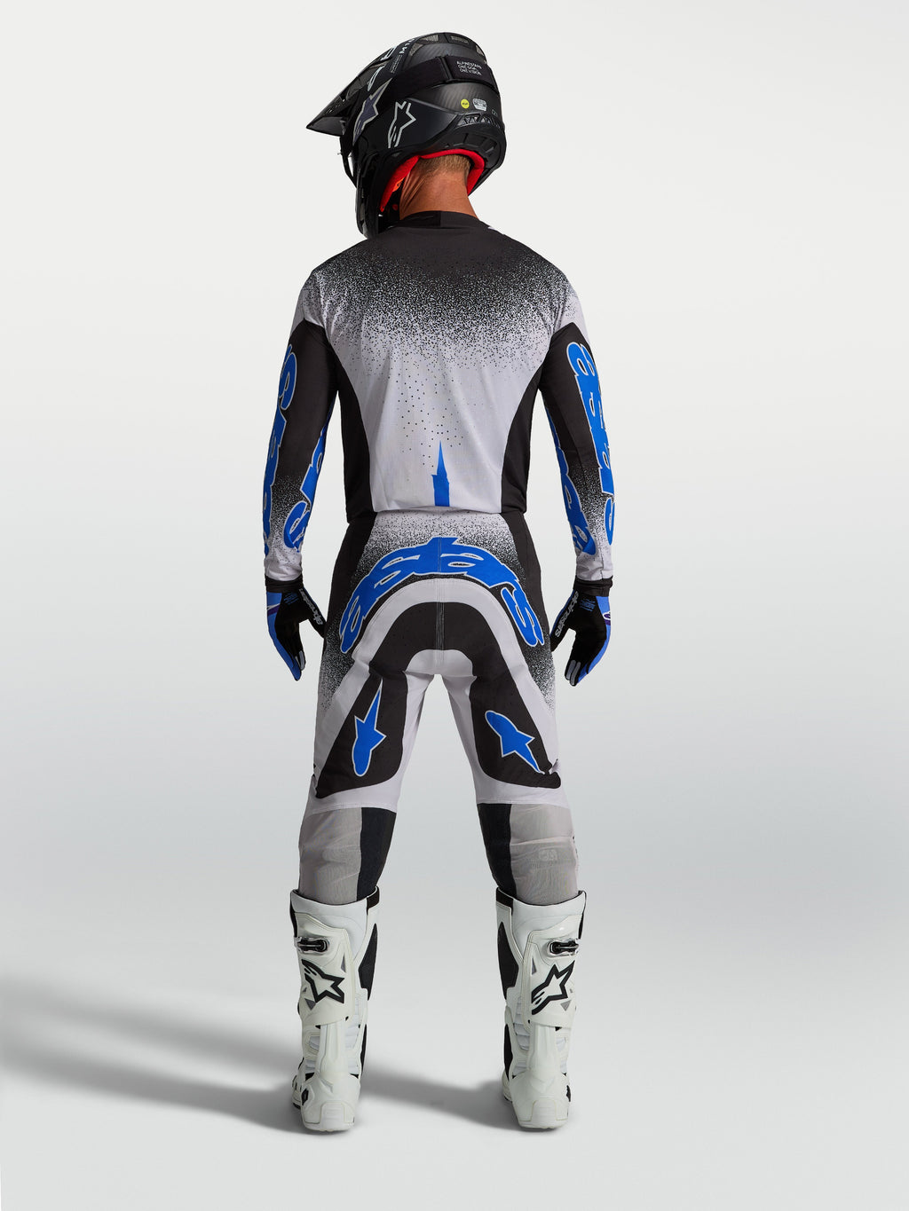 Pantalones Alpinestars Supertech Hiten AFD, equipo de motocross azul y blanco para hombre, vista trasera de ajuste atlético
