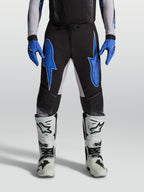 Alpinestars Supertech Hiten AFD, pantalones de motocross para hombre, negros y azules con ripstop elástico ligero.