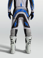 Alpinestars Supertech Hiten AFD, pantalones de motocross negros y azules para hombre, ajuste atlético de competición para MX.
