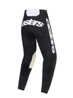 Pantalones Alpinestars 2026 Racer Air Riway, pantalones de motocross, negro y blanco, vista trasera con gran logotipo 'astars' blanco en el asiento y el lateral, canesú trasero blanco y refuerzos interiores de cuero en las rodillas en color blanco roto para un rendimiento off-road.