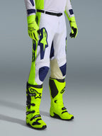 Alpinestars 2026 Racer Air Riway Gear Set, Motocross pants in white with navy and fluo yellow accents, paired with matching fluo yellow boots and gloves, featuring airflow perforations and ergonomic design, professional off-road racing outfit.
