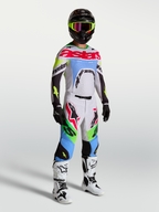 Pantalones Supertech Dyna de Alpinestars, equipo de motocross para hombre, lila claro y verde fluo, en modelo con kit de carreras completo.