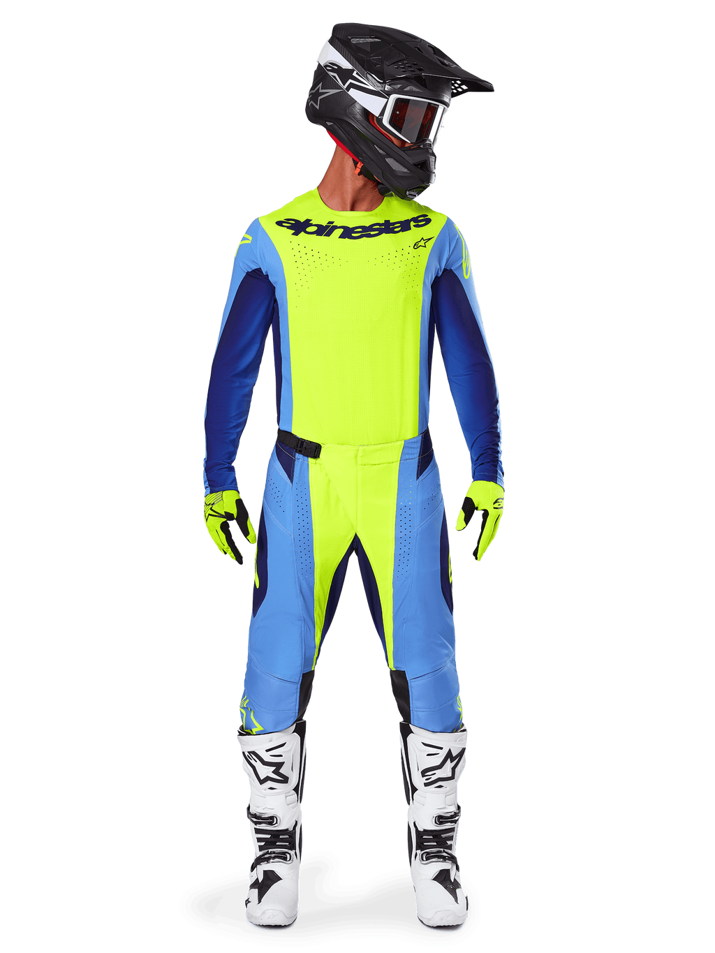 Piloto de motocross con el conjunto de equipo Alpinestars 2025 Techstar Melt, jersey amarillo flúor con mangas azules y azul marino, pantalones amarillos y azules a juego, casco negro y blanco con gafas, botas blancas y negras, guantes amarillos y negros, atuendo coordinado para carreras off-road