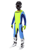 Alpinestars Techstar Melt Gear Set 2025, conjunto completo de motocross, amarillo neón y azul, casco negro con gafas, guantes amarillos y negros, botas blancas y negras, equipo integral de MX