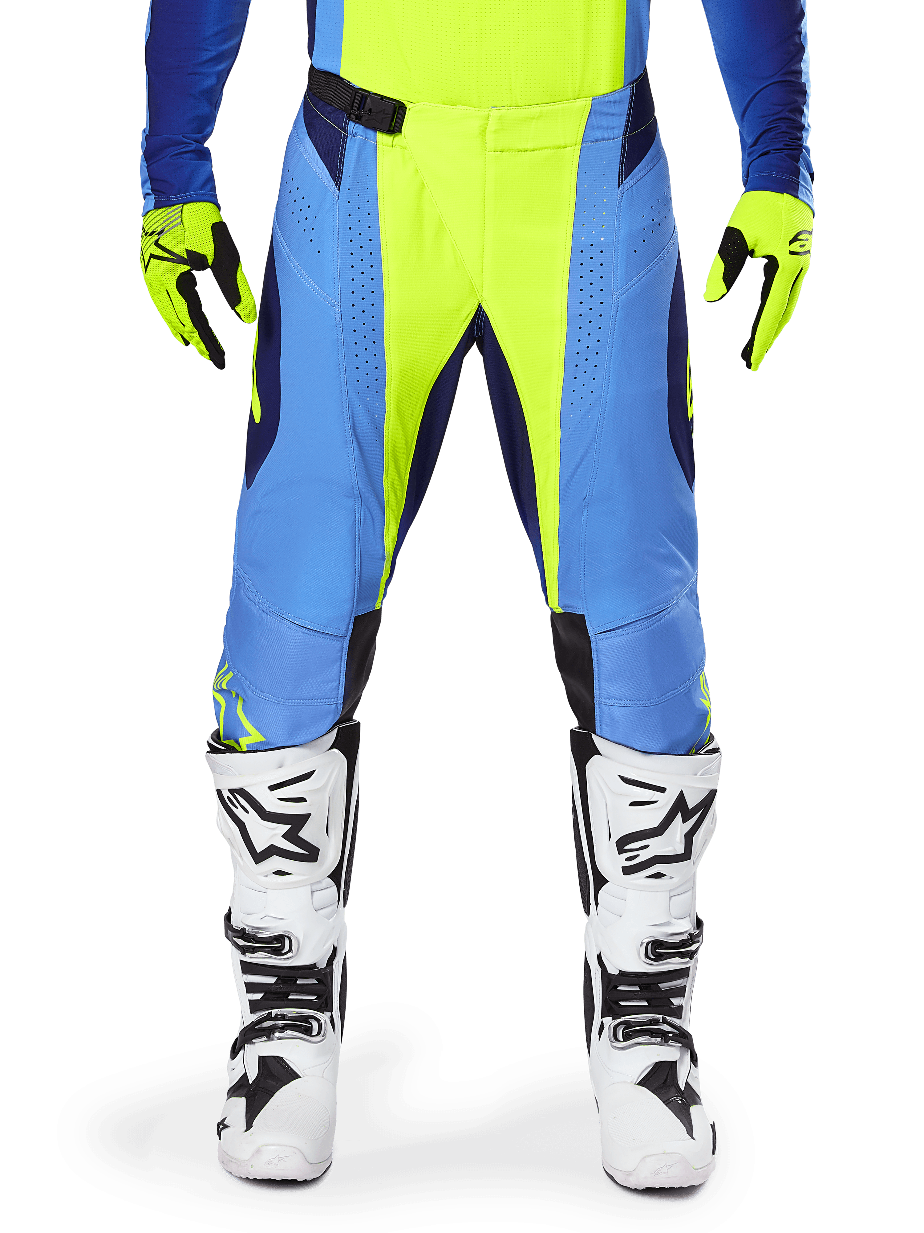 Alpinestars Techstar Melt Pants 2025, pantalones de motocross, amarillo flúor y azul, usados con guantes a juego y botas blancas, con paneles azules y detalles en amarillo flúor, diseño de alto rendimiento para carreras todoterreno