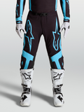 Alpinestars Supertech Vesta, pantalones de motocross para competición, negros y turquesas, con gráficos de estrella y paneles de cuero protectores